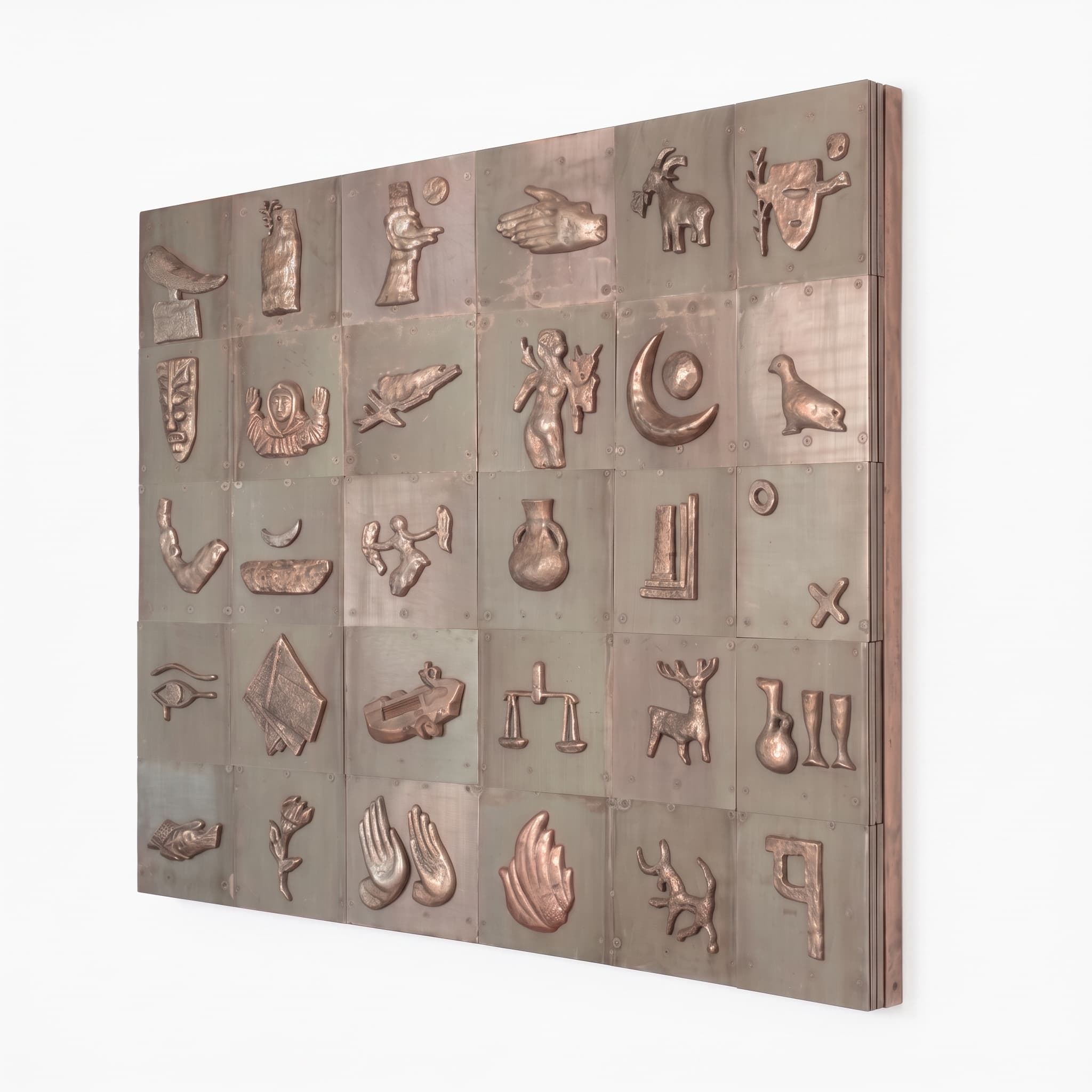 A large, rectangular wall-mounted art piece composed of multiple square panels, each featuring a distinct bas-relief sculpture. The reliefs depict a variety of abstract symbols, human figures, animals, and classical iconography. The material appears to be patinated bronze or a similar copper alloy, giving it a rich, textured, and aged appearance. — 3D model