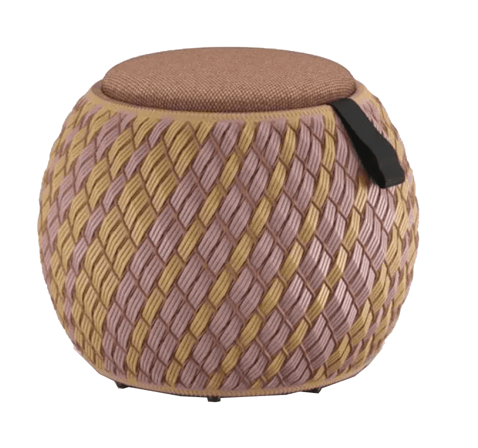 A spherical ottoman with a woven body and a fabric-covered top. The woven body is constructed from alternating strands of light pink and yellow material, forming a diamond pattern. A dark, possibly leather, strap is attached to one side for portability. The top cushion is upholstered in a textured, brown fabric. The base appears to have small, dark feet. — 3D model