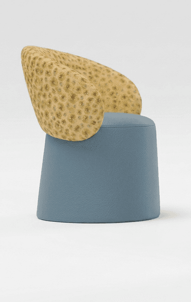 A contemporary sculptural accent chair featuring a unique two-tone design. The low, curved backrest is upholstered in a textured fabric with a detailed, coral-like pattern in muted yellow and tan. The integrated seat and conical, drum-shaped base are covered in a smooth, pale blue faux leather or vinyl material, creating a striking contrast in both color and texture. — 3D model