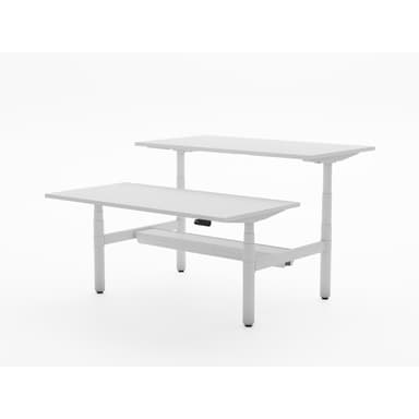 A modern, two-tiered electric standing desk, depicted in a minimalist white studio setting. It features two rectangular white tabletops at different heights, supported by a system of white metal legs and crossbars that are height-adjustable. The design is sleek and contemporary, likely indicating a motorized adjustment mechanism for ergonomic use. — 3D model