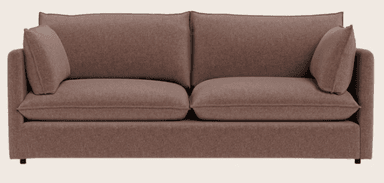 A contemporary three-seater sofa with a muted rose or dusty pink fabric upholstery. It features clean lines, wide track arms, two deep seat cushions, and multiple loose back cushions with piped edges, suggesting a comfortable and casual design. The sofa has a low profile with minimal or hidden feet. — 3D model
