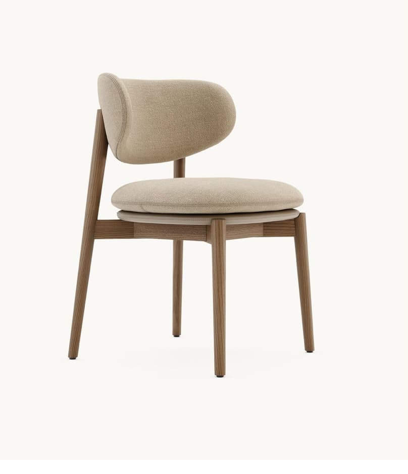 A contemporary dining chair featuring a light natural wood frame and upholstered seat and backrest. The backrest and seat are softly padded and covered in a light beige, textured fabric. The wooden legs are slightly tapered and splayed, providing a stable base for the chair. — 3D model