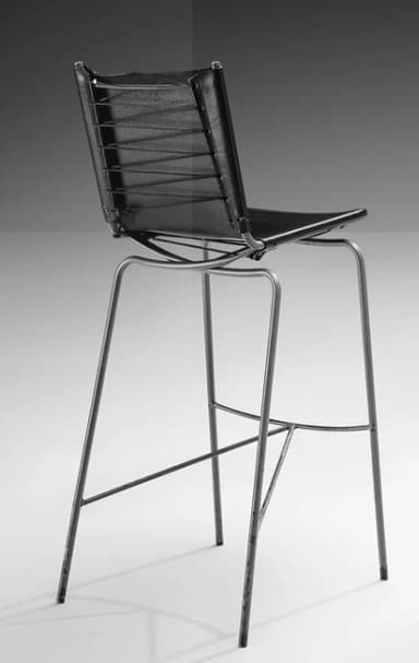 A bar stool with a black seat and backrest, supported by a thin, metallic frame with four legs connected by a crossbar for stability. The seat appears to be upholstered. — 3D model