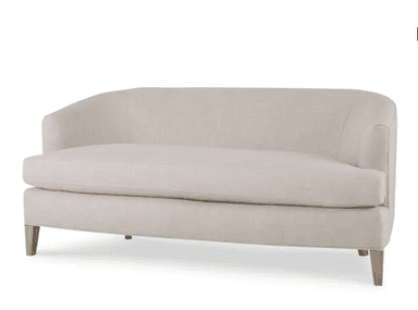 A contemporary sofa with a curved back and sleek, tailored upholstery. It features a single seat cushion and exposed wooden legs that taper slightly. — 3D model