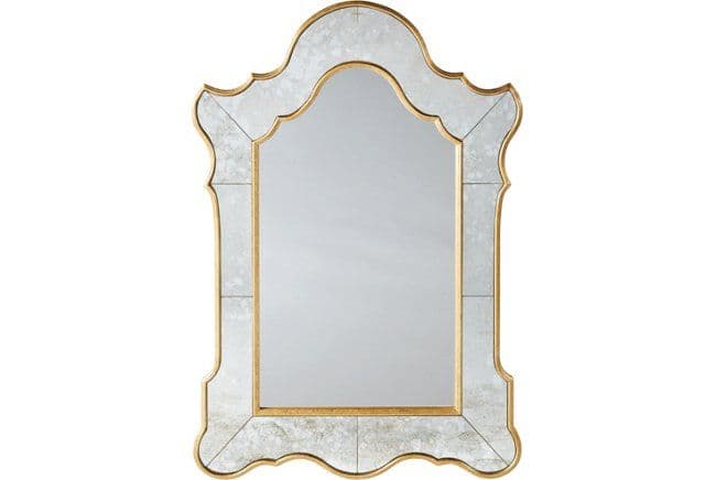 A decorative wall mirror with an ornate, arched frame. The frame has a scalloped, irregular silhouette and features a golden finish. The mirror itself is composed of multiple beveled mirror segments arranged in a pattern, with some segments exhibiting a distressed or antiqued finish. The overall aesthetic is opulent and traditional. — 3D model