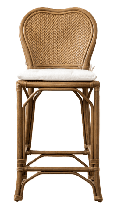 A classic bistro-style bar stool featuring a curved rattan frame and a heart-shaped, tightly woven rattan backrest. The stool includes a light-colored, padded seat cushion secured with white ties. An integrated footrest provides comfort and stability. The natural brown finish of the rattan gives it a warm, inviting aesthetic. — 3D model