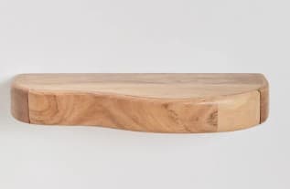 A single, natural wood shelf with a live edge. The shelf has a curved front edge and a flat top surface. The wood grain is visible, indicating a natural, organic form. It appears to be mounted on a wall, suggesting it is a floating shelf. — 3D model