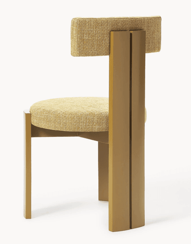 A modern dining chair with a distinct geometric design. The chair features a padded seat and a T-shaped backrest, both upholstered in a textured yellow fabric. The frame and legs are constructed from a solid material, possibly wood or metal, finished in a matte gold or brass color. The legs have a unique angular profile, with two parallel vertical elements forming each front leg. — 3D model