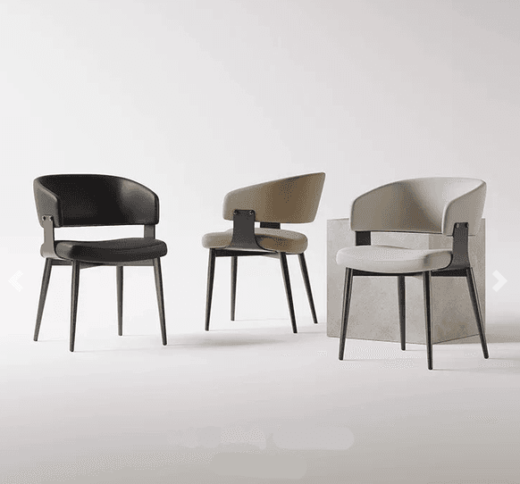 A modern dining armchair featuring a contoured black upholstered seat and backrest, supported by slender, tapered black metal legs. The backrest is gently curved and includes integrated armrests, connected to the seat base via visible black metal brackets. — 3D model