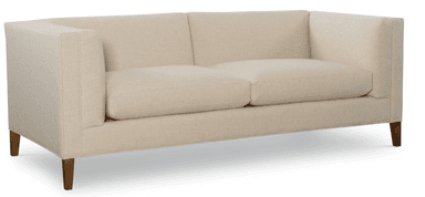 A contemporary two-seater sofa upholstered in a light-colored, possibly cream or beige, fabric. It features a clean, rectangular silhouette with track arms and two seat cushions. The sofa is supported by four tapered wooden legs. — 3D model