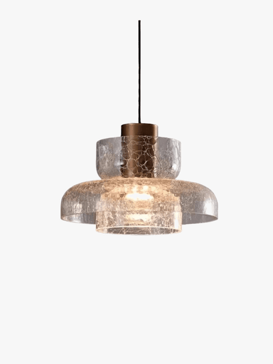 A modern pendant light featuring a layered, tiered design with frosted glass shades. The top section is connected to a dark green textile cord via a metallic, possibly copper or brass, cylindrical element. The light source is diffused by the white frosted glass, creating a soft glow. — 3D model