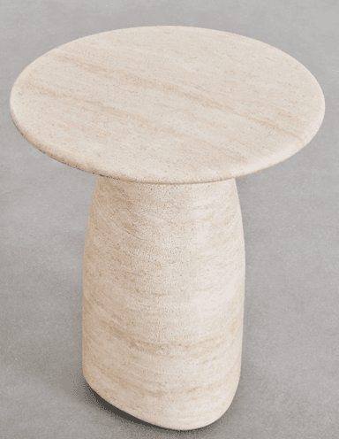 A modern end table with a rounded top and a tapered, monolithic base. The table exhibits a textured surface with visible striations consistent with natural stone. — 3D model