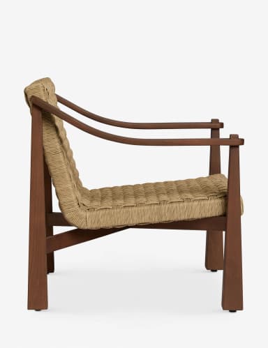 An armchair with a wooden frame and a woven seat and backrest. The frame has a dark wood finish and features gently curved armrests and square, tapered legs. The seat and back are constructed from a tightly woven natural fiber material in a light tan color, forming a geometric pattern. The design is minimalist and modern. — 3D model