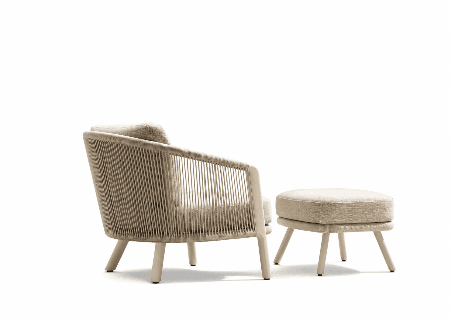 A modern armchair with an accompanying ottoman. The armchair features a woven rope back and sides, a cushioned seat and backrest, and light-colored wooden legs. The ottoman is upholstered and has similar light-colored wooden legs. Both pieces are presented against a clean white background. — 3D model