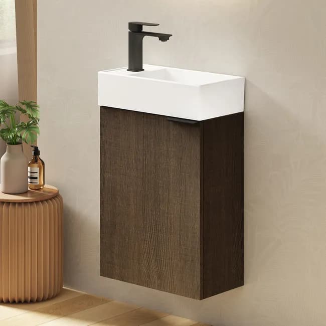A modern, wall-mounted vanity unit with a rectangular basin and a matte black faucet. The unit features a two-tone design, with a white ceramic or composite basin integrated into the top surface, and a dark wood-grain cabinet base. The cabinet has a minimalist, handle-less design. — 3D model