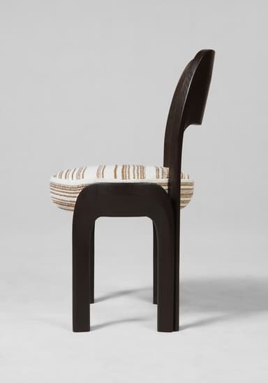 A dark wood dining chair with a rounded, split backrest and a woven seat cushion. The chair has a modern aesthetic with curved legs and a streamlined frame. The seat cushion is upholstered in a textured fabric with a striped pattern in white and brown tones. — 3D model