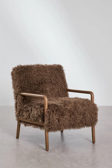 A compact armchair with a wooden frame and a plush, shaggy brown upholstery covering the seat, back, and arms. The wooden frame is visible at the legs, armrests, and where the back meets the seat. — 3D model