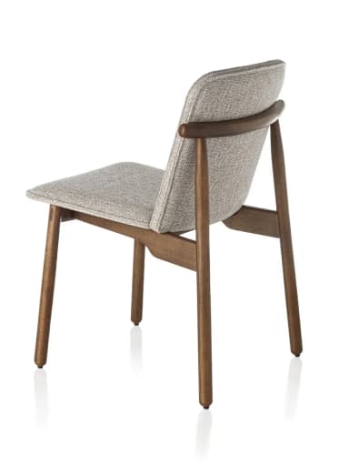 A modern upholstered dining chair featuring a solid wood frame and light grey textured fabric upholstery. The chair has a gently curved backrest supported by a distinctive rounded wooden element extending from the frame. The legs are tapered and match the wood finish of the frame. — 3D model