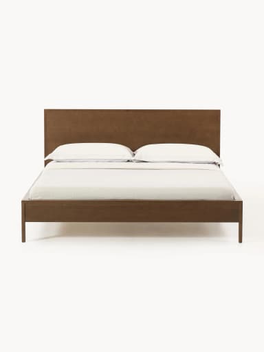 A modern platform bed featuring a clean, minimalist design crafted from dark-stained wood. It includes a solid, rectangular panel headboard and a low-profile frame with integrated legs, designed to support a mattress without the need for a box spring. The bed frame exhibits a smooth, finished surface. — 3D model