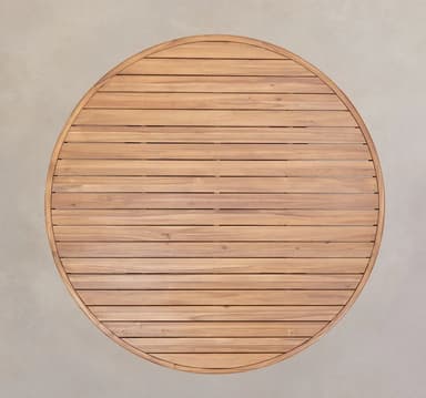 A round wooden coffee table with four thick, cylindrical legs. The tabletop has a slatted surface and a rounded edge. The legs are textured with vertical grooves. The design appears to be modern or contemporary, possibly intended for outdoor use due to the material. — 3D model