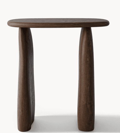 A side table with a rounded rectangular top and two thick, curved, sculptural legs. The wood grain is visible, suggesting a solid wood construction. — 3D model
