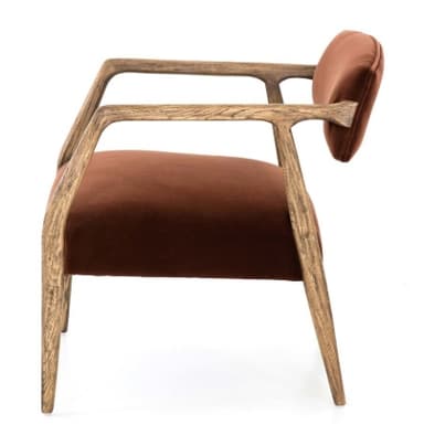 An armchair featuring a solid wood frame with curved armrests and upholstered seat and back in a rust-colored velvet fabric. The wooden frame exhibits a prominent grain, suggesting oak or a similar light-colored wood, and includes four tapered legs. The design combines mid-century modern aesthetics with contemporary comfort. — 3D model