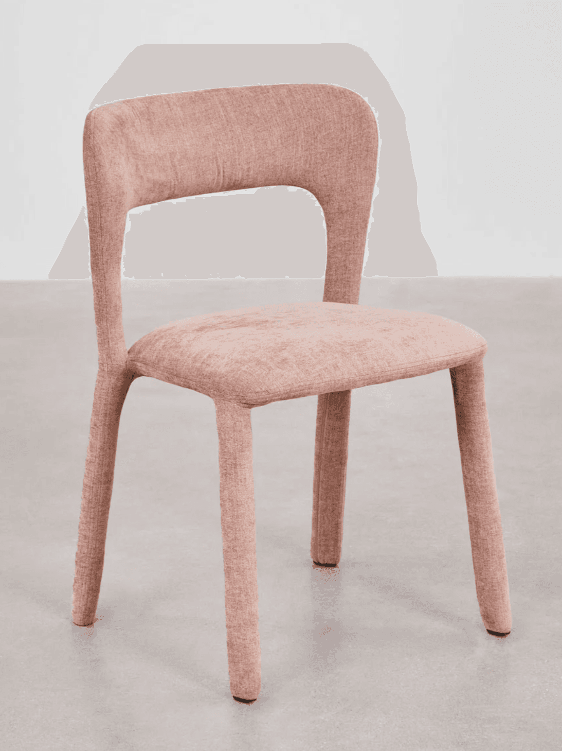 A contemporary dining chair with a molded seat and backrest upholstered in a textured fabric. The chair features four tapered legs that extend upwards to form the frame for the seat and back. The backrest has a distinctive cut-out opening. — 3D model