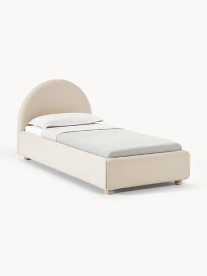 A contemporary single bed featuring an upholstered frame in a light neutral fabric, complemented by a distinctive rounded headboard. The bed includes a mattress with white bedding and a light grey duvet or blanket. It stands on four short, light-colored wooden feet, presenting a clean and minimalist aesthetic suitable for modern interiors. — 3D model
