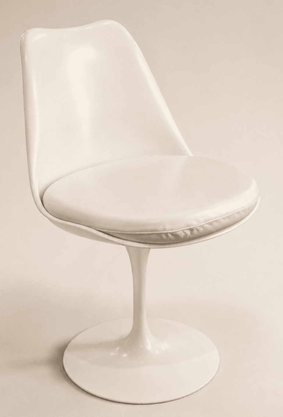 An off-white, armless dining chair featuring a molded fiberglass or plastic shell seat with an integrated, removable upholstered cushion, all supported by a distinctive single pedestal base that flares out to a circular footprint. — 3D model