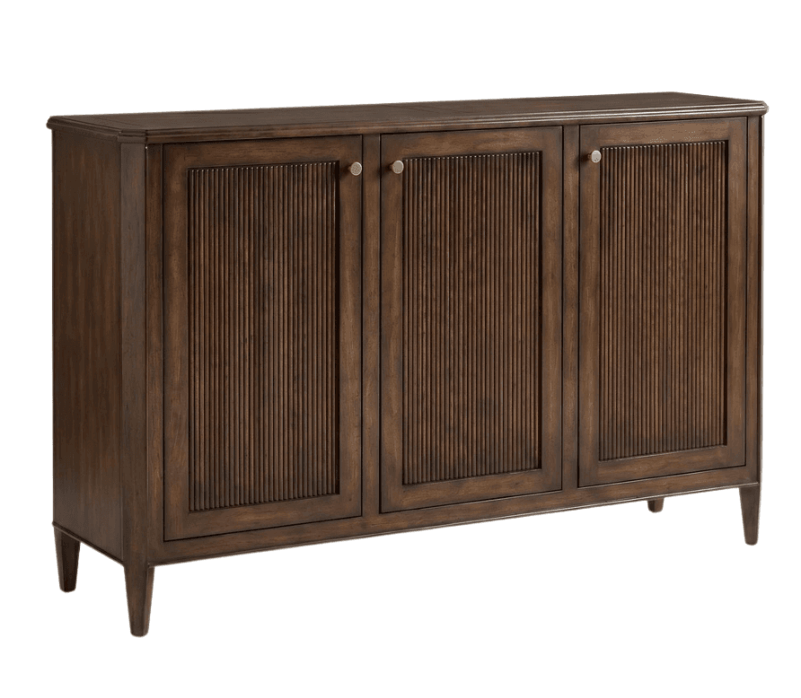 A dark brown wooden sideboard featuring three cabinet doors. Each door has vertically reeded panels. The unit stands on four short, tapered legs and is equipped with small, round brass-colored knobs. — 3D model