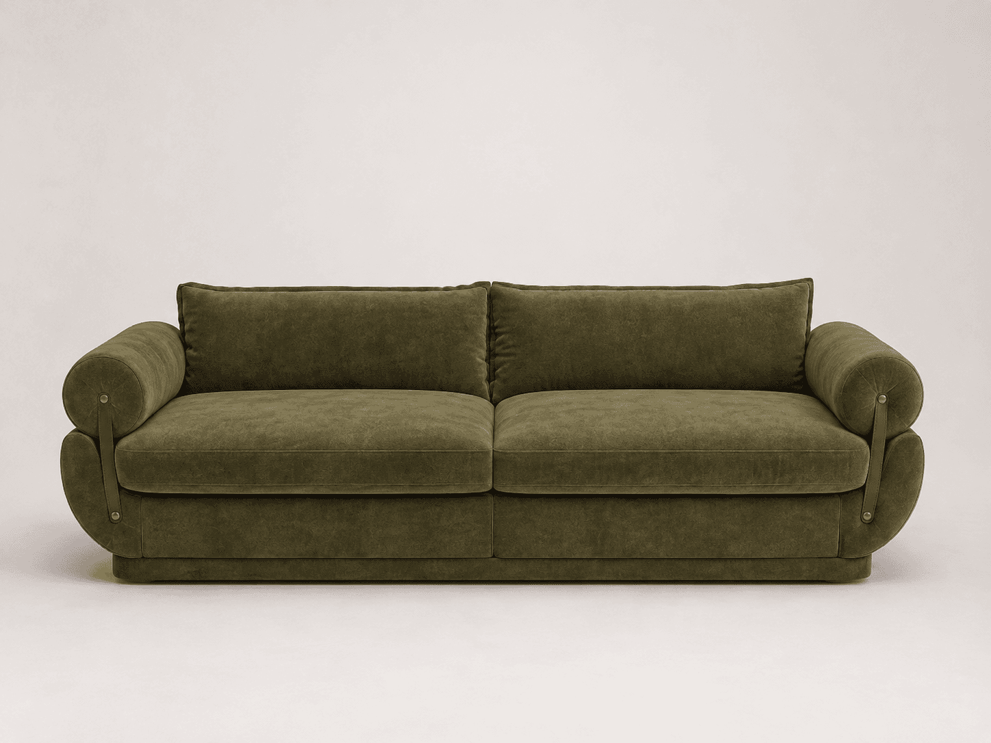 A contemporary two-seater sofa upholstered in a plush olive green velvet fabric. It features a low-profile base, two large seat cushions, and two back cushions. The distinctive armrests are cylindrical bolsters, which are held in place by contrasting brown leather straps with brass-colored metal fasteners. The overall design is sleek and modern, emphasizing comfort and sophisticated detail. — 3D model