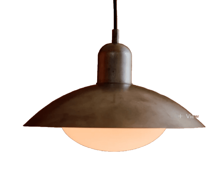 An industrial-style pendant light featuring a wide, shallow dome shade crafted from aged brass, suspended by a black electrical cord. The light source is diffused at the bottom, providing directed illumination. The overall aesthetic is minimalist and functional, highlighting the metal's texture and finish. — 3D model