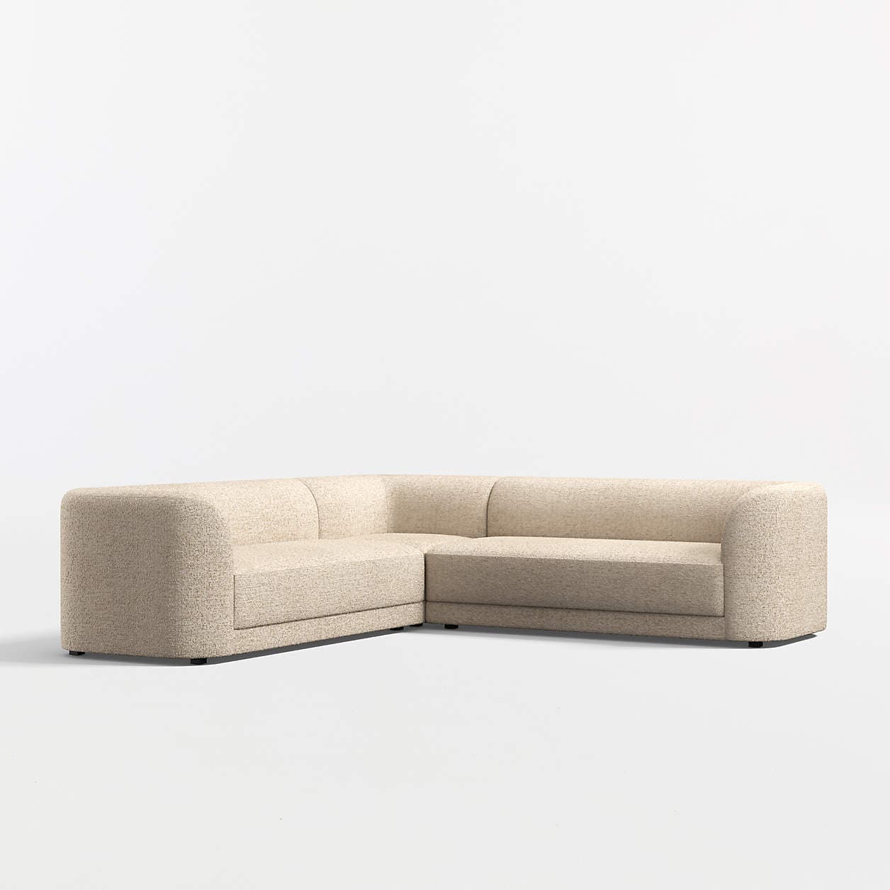A sectional sofa with a neutral-toned, textured fabric upholstery. The sofa features rounded armrests and backrests, creating a soft, modern aesthetic. It is configured in an L-shape, comprising at least two distinct seating modules. — 3D model
