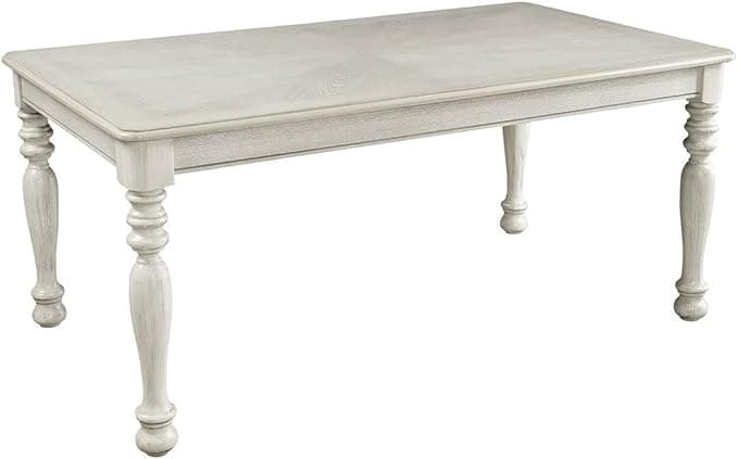 A rectangular dining table featuring a distressed white finish and ornately turned legs. The tabletop has a subtle radial pattern in its wood grain. — 3D model