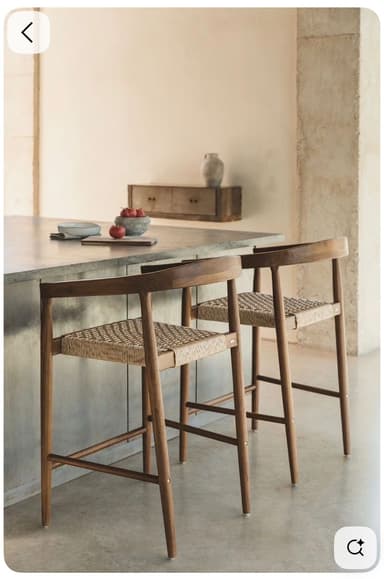 A wooden bar stool featuring a curved backrest and armrests, with a tightly woven natural cord seat and slender wooden legs. — 3D model