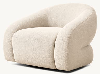 A contemporary armchair with a distinctive rounded silhouette. The chair features a plush, textured upholstery and a low-profile base. Its design emphasizes comfort and organic forms, suitable for modern living spaces. — 3D model