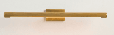 A horizontal, elongated wall-mounted LED light fixture, crafted from brass or a brass-toned metal. The main cylindrical body features a distinct ribbed texture and emits light from a continuous strip along its bottom edge. It is affixed to the wall by a rectangular mounting plate, creating a minimalist and functional aesthetic. — 3D model