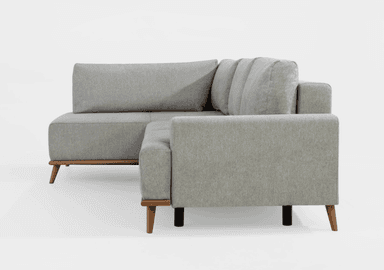 A light grey fabric sofa viewed from the rear and side. It features a three-seat configuration with distinct cushions visible at the top. The sofa has a modern design with clean lines, square arms, and is supported by a combination of dark and wooden tapered legs. The fabric appears to be a textured weave. — 3D model