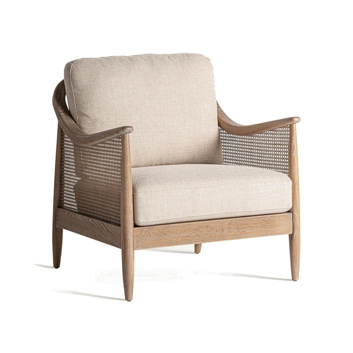 An armchair featuring a light-toned wooden frame with woven cane panels on the sides and back, complemented by thick, removable upholstered cushions in a neutral beige fabric. The design is modern with a nod to natural textures and materials. — 3D model