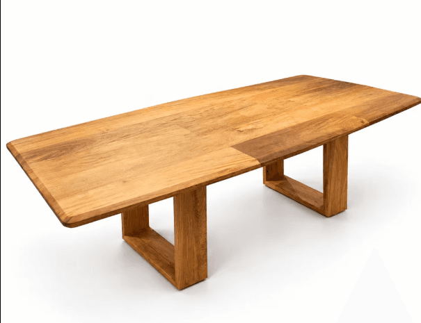 A contemporary, rectangular dining table constructed from solid wood, featuring a substantial tabletop and two robust, box-shaped leg supports. — 3D model