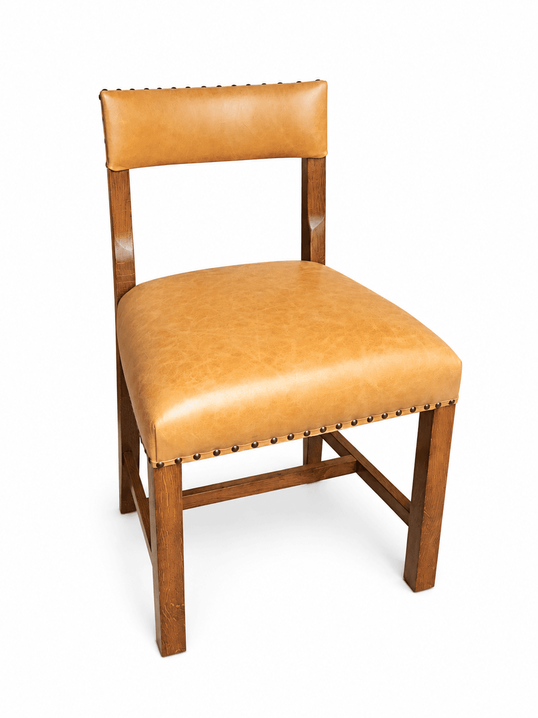 A wooden-framed chair with a tan leather upholstered seat and back, featuring decorative nailhead trim around the edges of the upholstery. — 3D model