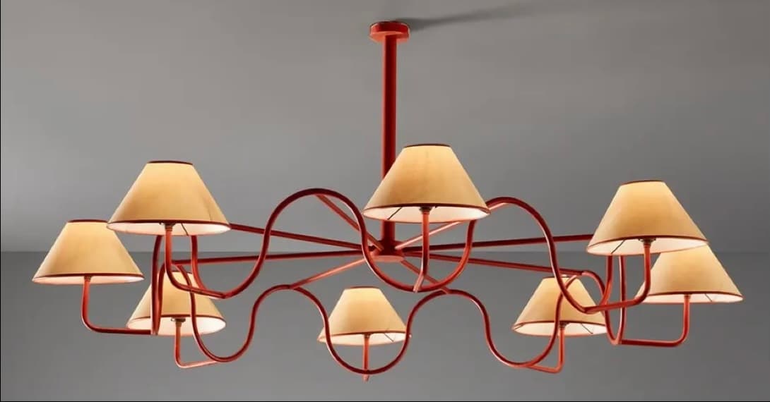 A decorative chandelier with a central rod from which several curved metal arms extend, supporting eight conical lampshades. The metal structure has a reddish-brown hue and features a flowing, organic design. The lampshades are a light beige color with a darker trim. — 3D model