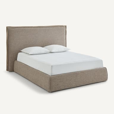A contemporary low-profile platform bed featuring a fully upholstered frame and an integrated headboard with subtly angled sides, all covered in a neutral, textured fabric. — 3D model