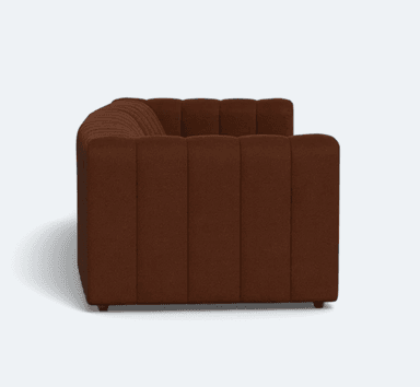 A three-seater sofa upholstered in a textured brown fabric. The sofa features a channel-tufted design on the back cushions and seat, creating vertical pleats across its surface. It has a low-profile frame with subtly rounded corners and short, dark legs. The overall aesthetic is modern and inviting. — 3D model