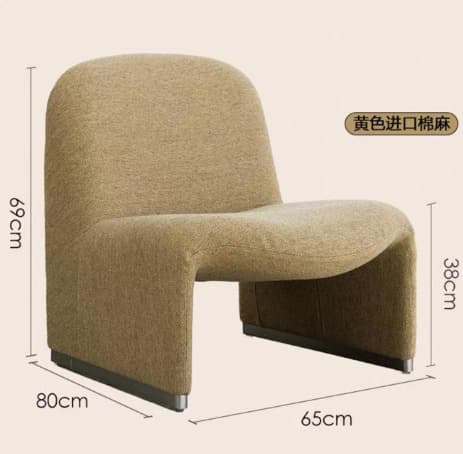 A contemporary armchair with a curved, organic silhouette. It features a low profile and a fully upholstered body with a textured fabric. The chair has a distinctive U-shaped base with a slender metal plinth at the bottom, providing subtle support. — 3D model