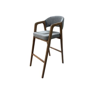 A modern bar stool with a white frame and a teal upholstered seat and backrest. The frame is constructed from a solid material, likely wood or metal, and has a sleek, minimalist design. The seat and back are cushioned and upholstered in a textured teal fabric. The stool features integrated armrests that are part of the frame structure. It includes a footrest connecting the front legs. The overall aesthetic is contemporary and functional. — 3D model