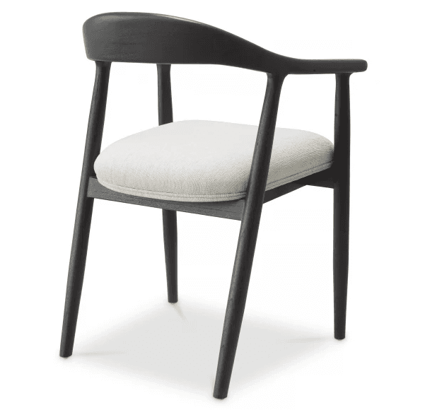 A modern armchair featuring a dark-stained solid wood frame with elegantly curved armrests and backrest, paired with a circular light beige upholstered seat cushion. The chair has rounded, tapered legs that splay slightly, giving it a stable yet refined appearance. — 3D model