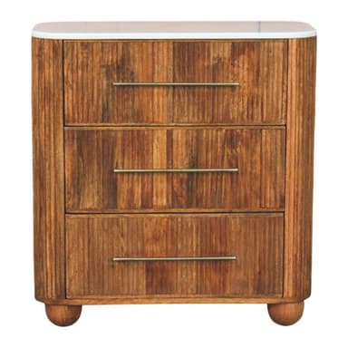 A compact chest of drawers featuring three horizontal storage drawers. The main body and drawer fronts are constructed from wood with a distinctive fluted or reeded texture, giving it a tactile appearance. It is topped with a smooth, light-colored slab, likely marble or a similar stone, which has gently rounded corners. Each drawer is fitted with a slim, horizontal bar pull made of metal. The entire unit stands on four short, rounded bun feet. — 3D model
