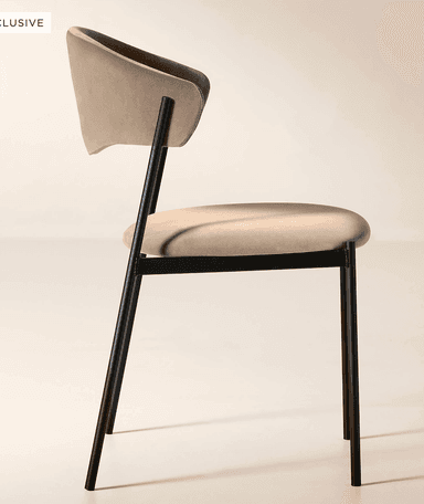 A modern dining chair featuring a black metal frame and light beige upholstered seat and a distinctively curved backrest. — 3D model