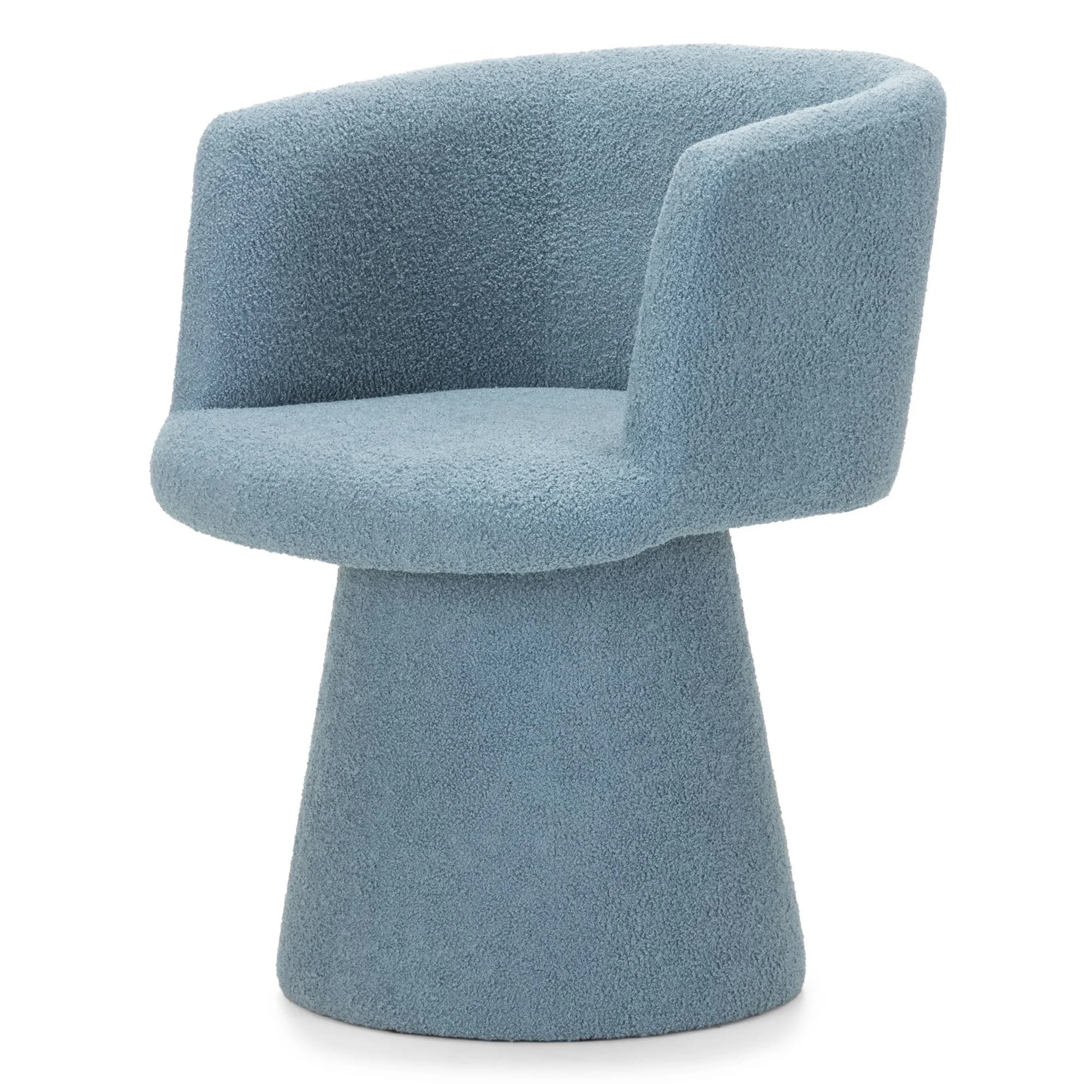 A modern armchair with a rounded, sculptural form. It features a high, enveloping backrest and armrests that merge seamlessly into the seat. The base is a solid, truncated cone pedestal, providing a stable foundation. The upholstery has a textured, looped pile fabric. — 3D model